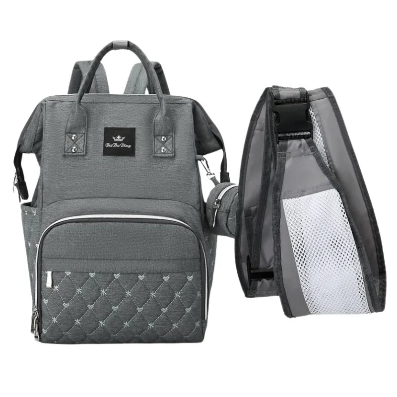 Luxury Diaper Backpack – Chic Quilted Style with Built-In Stroller Straps & Accessory Pouch